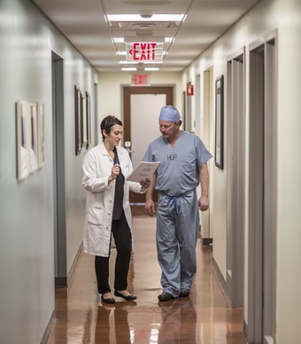 Dr. O'Rourke Walking Hallway